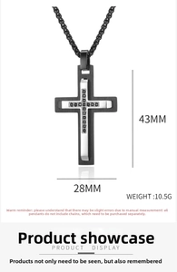 Detail view of dual-tone 316L stainless steel cross pendant with black zircon stone