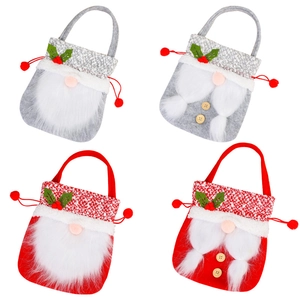 Set of four red and gray felt Christmas gift bags with gnome and Santa designs