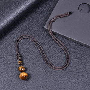 Adjustable brown braided rope necklace with three natural tiger eye stone beads