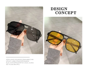 Detailansicht der Vintage-Sonnenbrille mit Doppelsteg in Schwarz und Bernstein-Optik