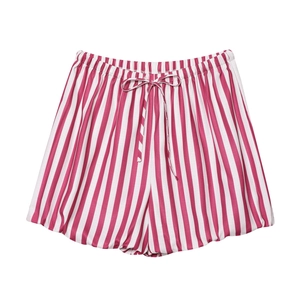 Red and white vertical striped drawstring shorts in a clean flat lay minimalist display