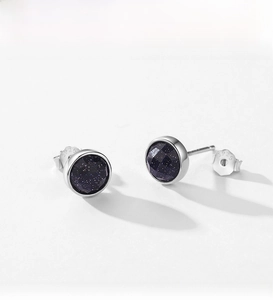 Detail of S925 sterling silver earrings with blue sandstone and S925 hallmark stamp