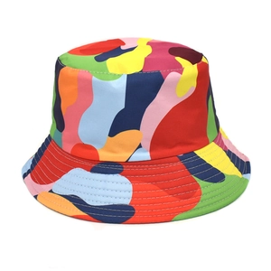 Detailed view of colorful camouflage pattern and stitching on a wide-brim bucket hat