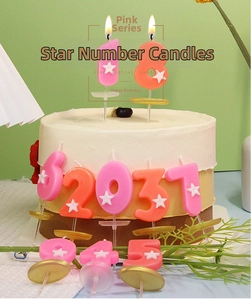Candeline di compleanno rosa e arancioni da 0 a 9 con decorazione a stelle