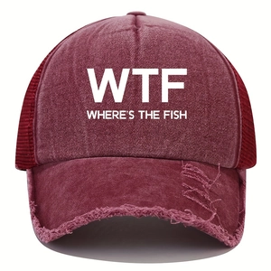 Detail of burgundy trucker hat showing distressed brim and WTF text print