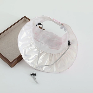 Internal view of a sun visor with UV coating, breathable mesh, and adjustable wind cord
