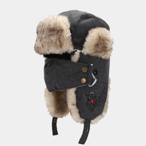 Winter trapper hat in dark grey with warm faux fur lining and integrated face mask