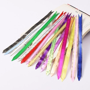 Selection of colorful 15# plastic pull bows for gift wrapping and holiday decoration