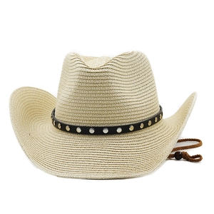 Detailed macro view of woven straw cowboy hat with black leather band and silver buckles