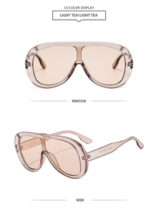 Detail of light tea shield sunglasses showing front and side views with model W12232