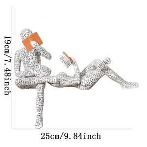 Detail shot showing dimensions for reading pulp couple sculptures with letter patterns