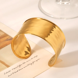 Hammered texture 18K gold-plated stainless steel wide cuff bracelet in minimalist setting