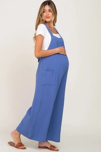 Detailed view of blue cotton linen maternity overalls with side pockets and wide leg cut