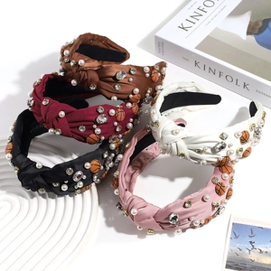 Vintage knotted headbands with rhinestones, pearls, and basketball beads in five colors