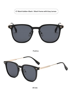 Detail view of square black and gold sunglasses with slim metal temples and nose pads