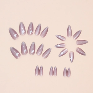 Lavender cat-eye almond press-on nails with white butterfly patterns and silver French tips
