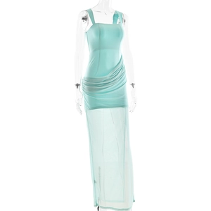 Close-up of ruched waist details and mesh patchwork on a teal backless maxi dress