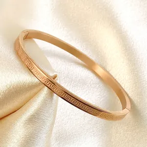 Classic rose gold stainless steel Greek key pattern bangle with side clasp for women
