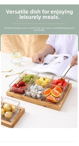 Close-up of six clear glass snack bowls with gold rims on a rectangular wooden tray
