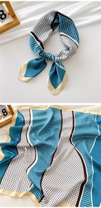 Detail of 70cm silk scarf with geometric patterns and smooth texture for hair or neck