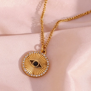 18K gold plated stainless steel sunburst coin necklace with evil eye and crystals