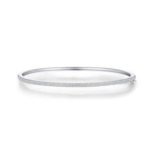 Elegant s925 silver bangle with shimmering pavé set diamonds and minimalist hinge closure