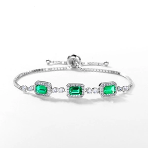 S925 sterling silver bracelet featuring three emerald-cut green gemstones and diamonds