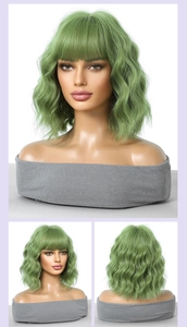 Three-way view of green short wavy bob wig with bangs showing front, side and back details