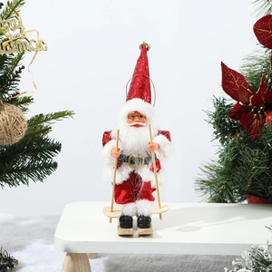 Detail of a skiing Santa Claus doll with red clothes, wooden skis, and snowy white fur