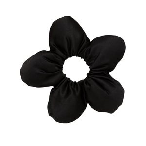 Elegant 3D fabric flower hair scrunchie in black with minimalist petal design on white backdrop