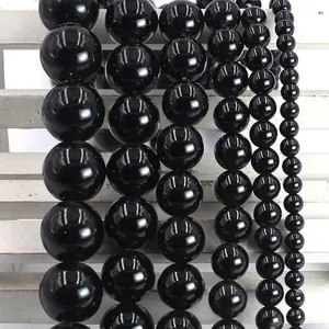 Polished natural black agate round beads in multiple sizes from 4mm to 16mm for DIY jewelry
