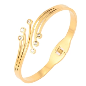 Elegant gold titanium steel cuff bracelet featuring zircon crystals and a layered tassel design