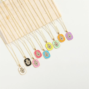 Colorful Hamsa Hand pendant necklaces with cubic zirconia and evil eye on gold chains