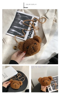 Detail view of the brown teddy fleece bear crossbody bag with woven shoulder strap