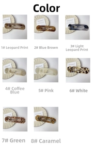 Close-up of assorted acetate hair clips with leopard, marble, and amber textures