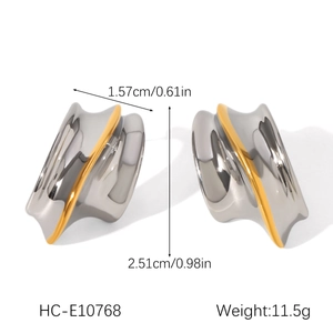 Detailed technical drawing of mixed gold and silver earrings with size and weight specs