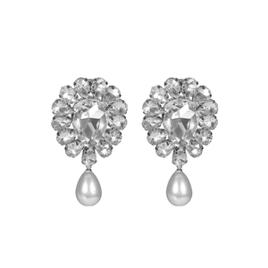 Luxurious floral crystal rhinestone earrings with white teardrop pearl drops on white background