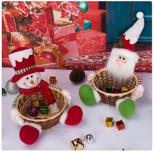 Detail of Santa and Snowman bamboo candy baskets with long legs and festive holiday decor