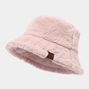 Pink plush bucket hat for winter featuring a snowflake leather patch and soft fluffy texture