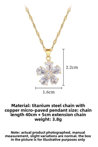 Detailed view of titanium steel chain and flower pendant with cubic zirconia inlay