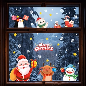 Santa and snowman static window decals applied to glass with a snowy winter background