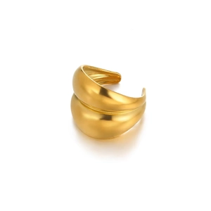 Detailed view of golden stainless steel ring with wrinkled texture and imitation pearl