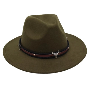 Detail of the dark olive green fedora hat featuring a bull skull metal ornament and studs