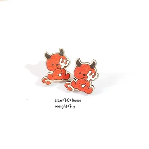 Detailed view of red wooden devil earrings with pitchfork measuring 20x16mm