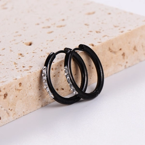 Chic black stainless steel hoop earrings featuring clear crystal side accents on stone base