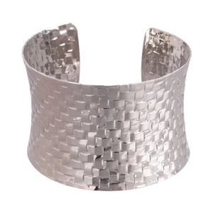 Wide silver woven metal cuff bracelet with geometric texture in an open design