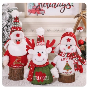 Detailed view of Christmas knitted figurines featuring Santa, reindeer and snowman decor