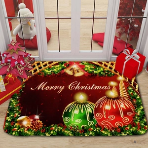 Detailed view of red Merry Christmas flannel floor mat with ornaments and candles