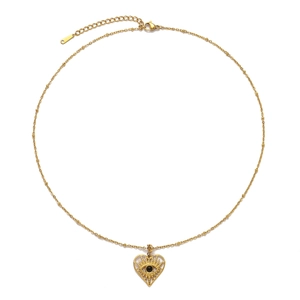 Detail of gold heart Evil Eye pendant on stainless steel necklace with extension chain