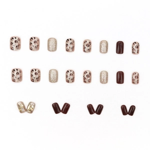 French leopard print press-on nails set with gold glitter and luxury rhinestones